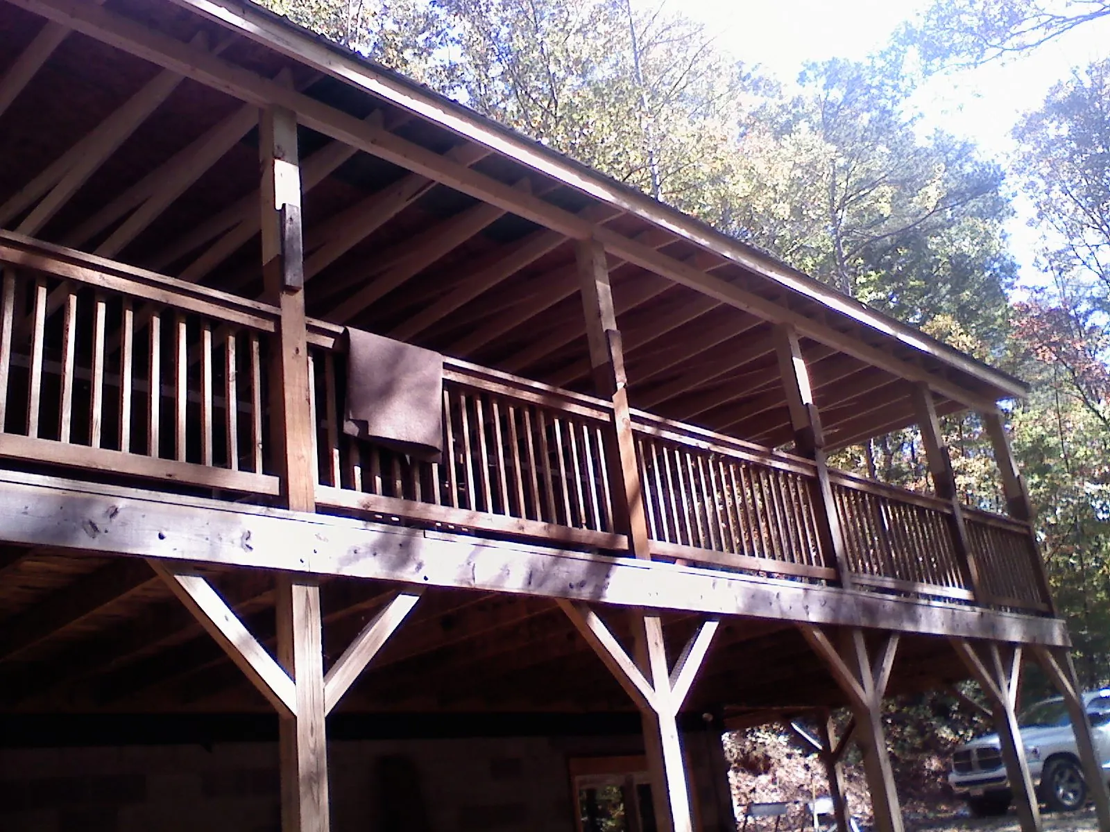 Timber framing under a new elevated porch and deck — Roof Leak Repair in Log Lane Village by Roofing Brothers